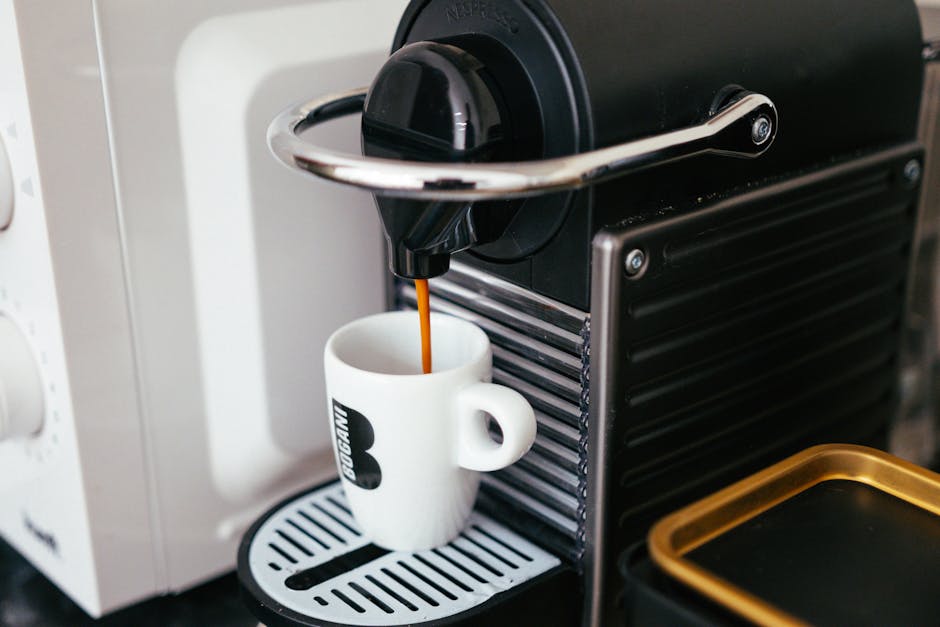 An automatic coffee machine brewing a morning cup